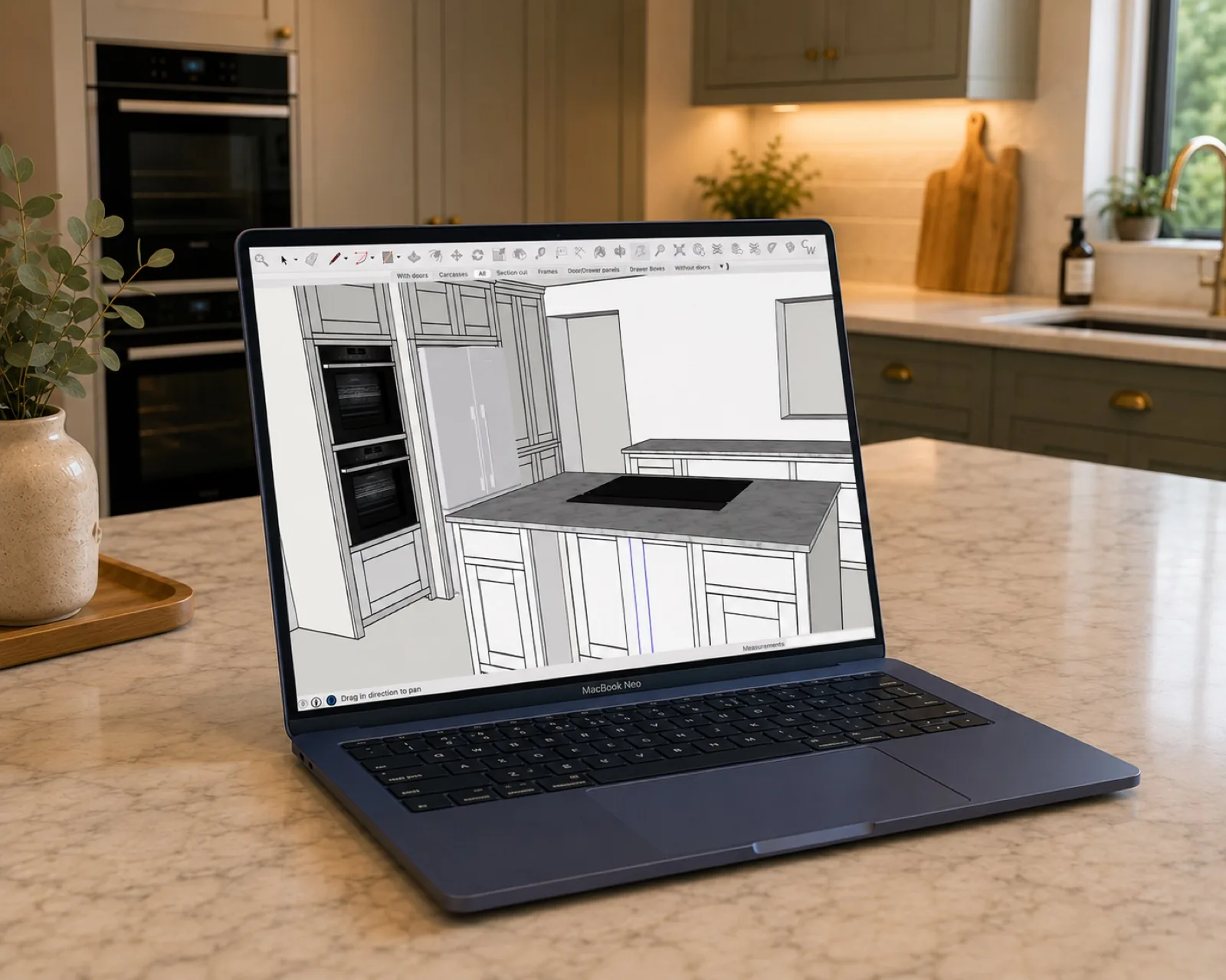 3D design of a bespoke shaker kitchen on a laptop screen